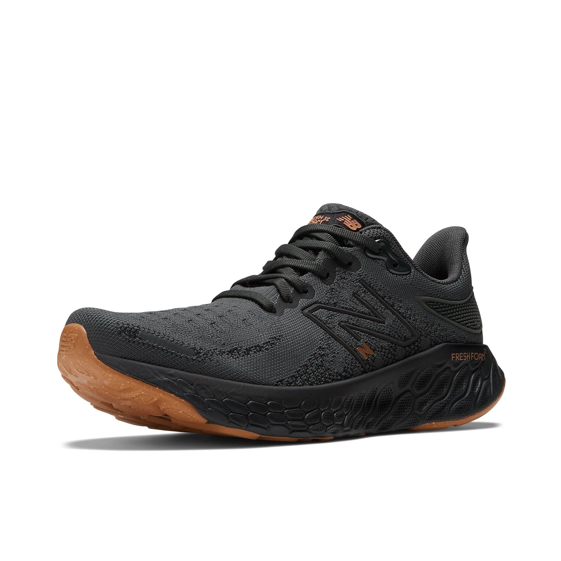 Front angle view of the Women's New Balance Fresh Foam 1080 V12 in the color Blacktop/Lounge