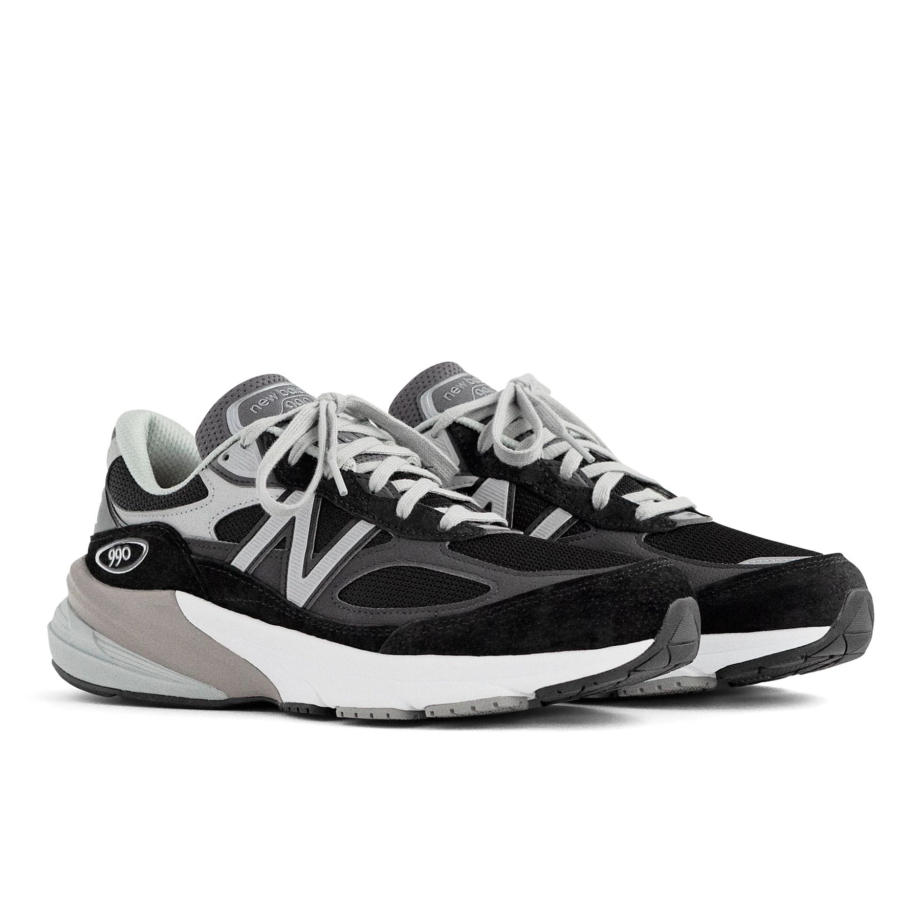 Front angle view of the Men's New Balance 990 V6 lifestyle shoe in Black/White