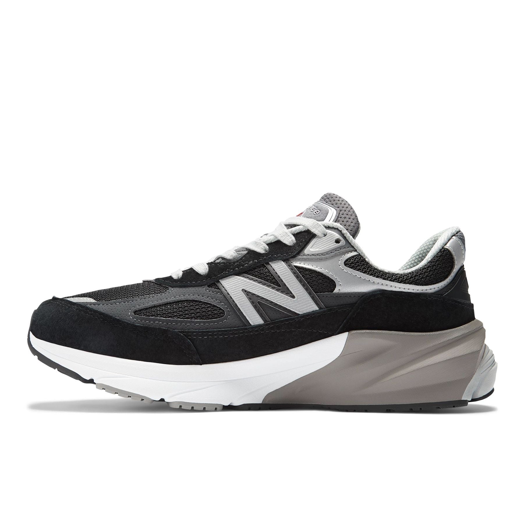 Medial view of the Men's New Balance 990 V6 lifestyle shoe in Black/White