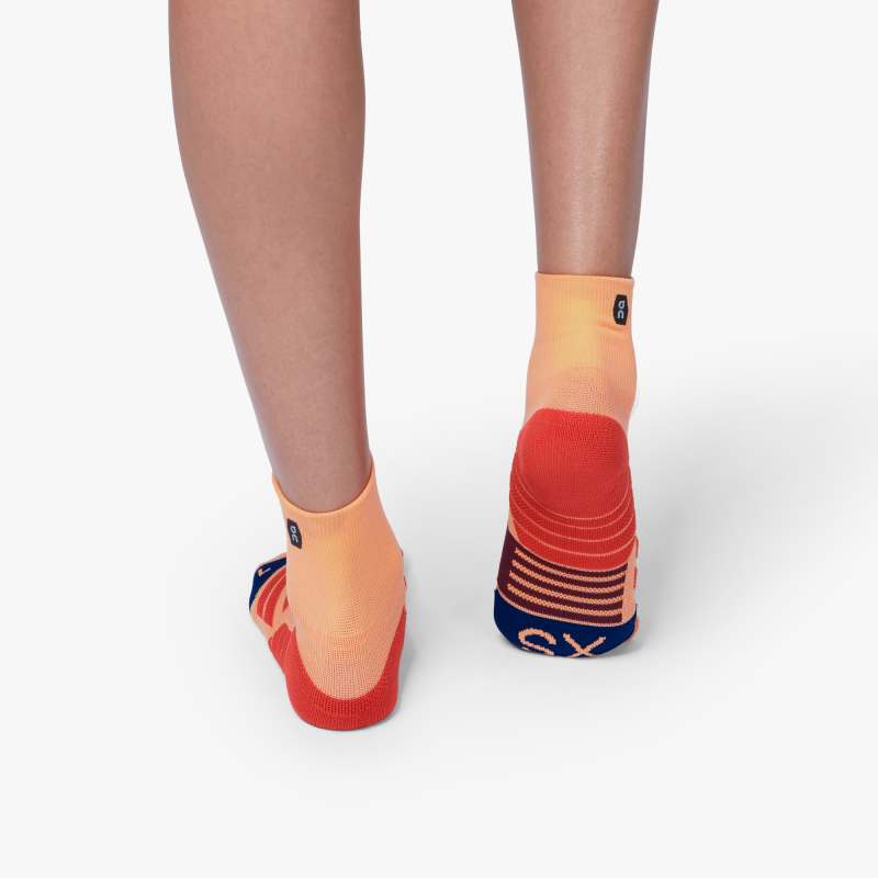 Back view of the Women's ON Mid Sock in the color coral navy