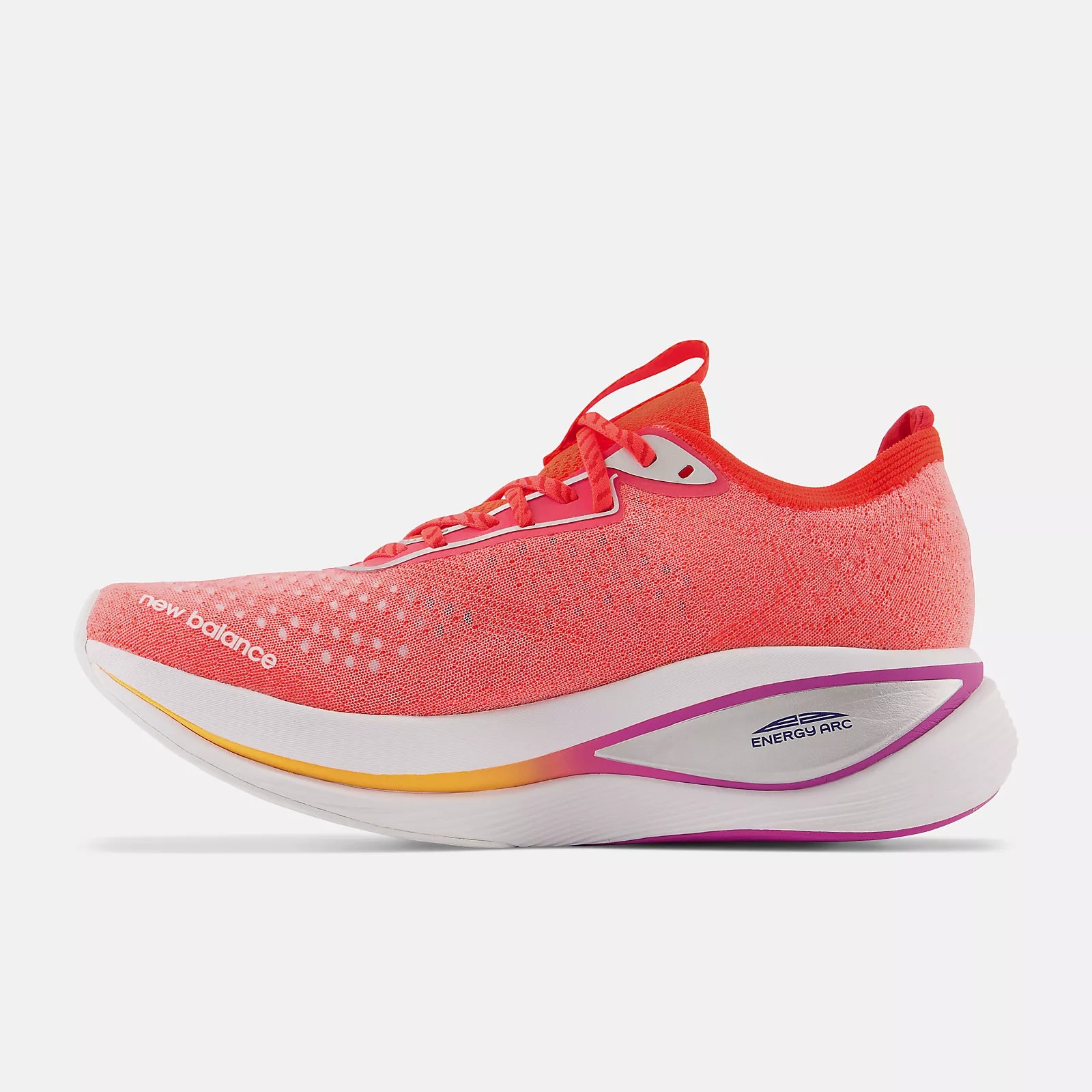 Medial view of the Men's Fuel Cell SuperComp Trainer by New Balance in the color Electric Red/Metallic Silver
