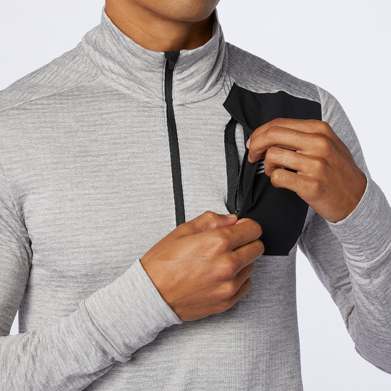 Zoomed in front view of the Men's Impact Run Heat Grid Half Zip in the color Athletic Grey