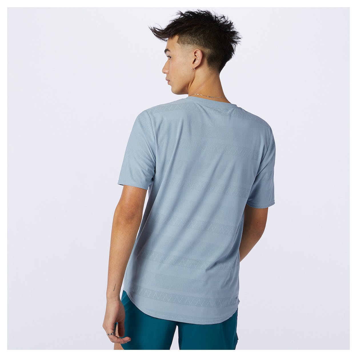 Back view of the Men's Q Speed Jacquard Short Sleeve by New Balance in the color Light Slate