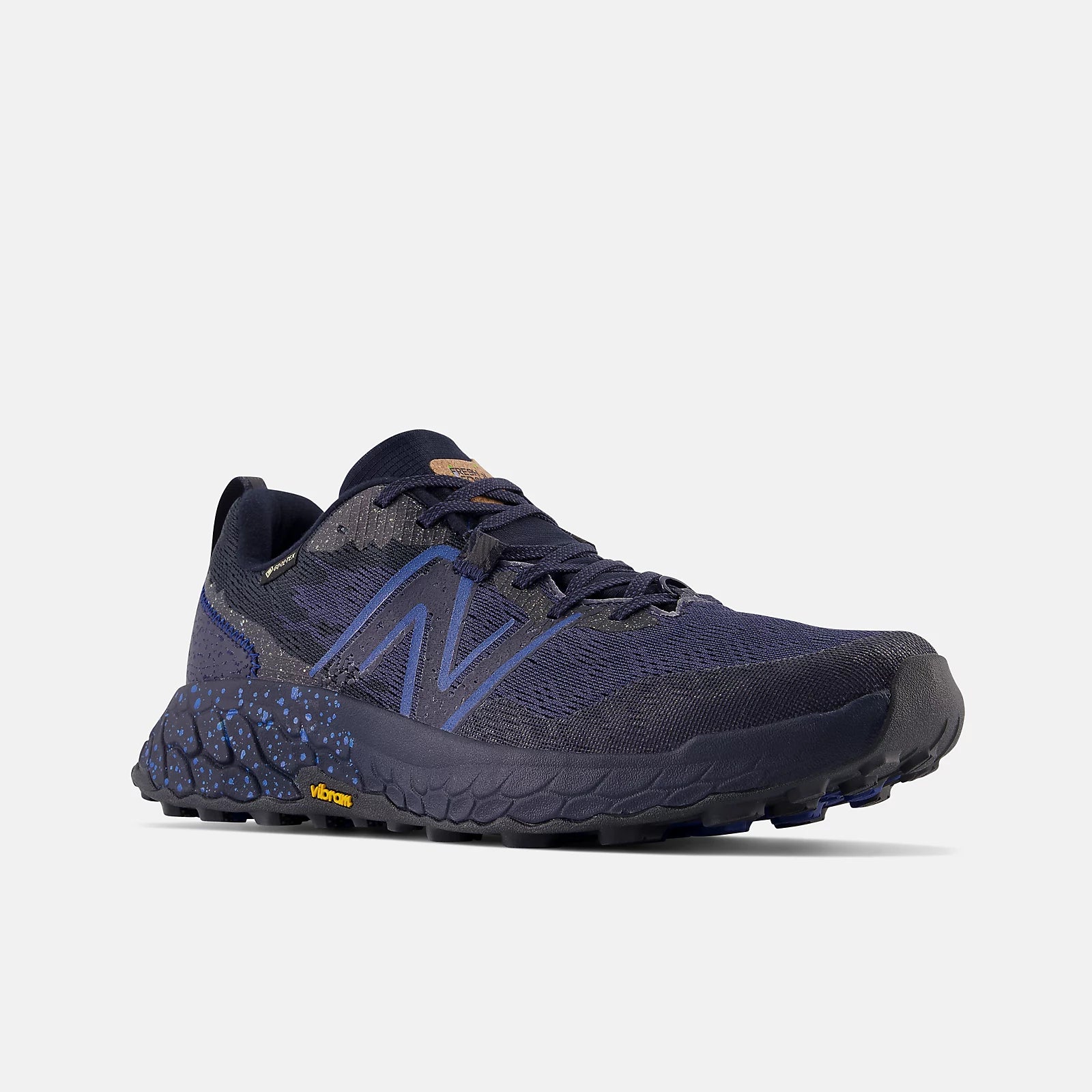 Front angled view of the Men's Hierro V7 Gortex trail runner by New Balance in the color Eclipse/Natural Indigo