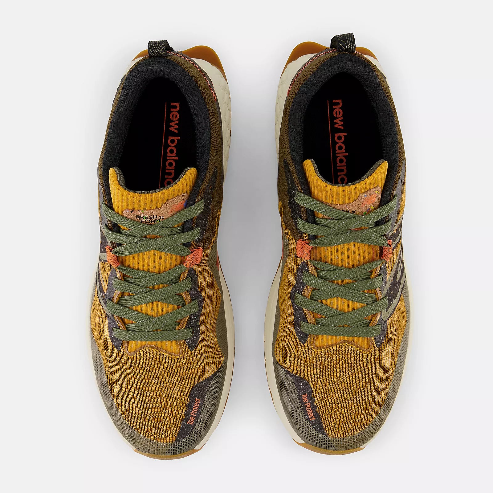 Top view of the Men's Hierro V7 trail runner by New Balance in the color Golden hour/Dark Camo/Black