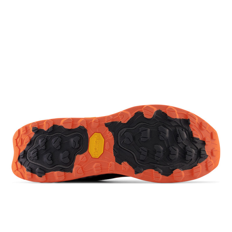 Bottom (outer sole) view of the Men's Hierro 7 trail shoe by New Balance in the color Thunder/Vibrant Orange/Apricot