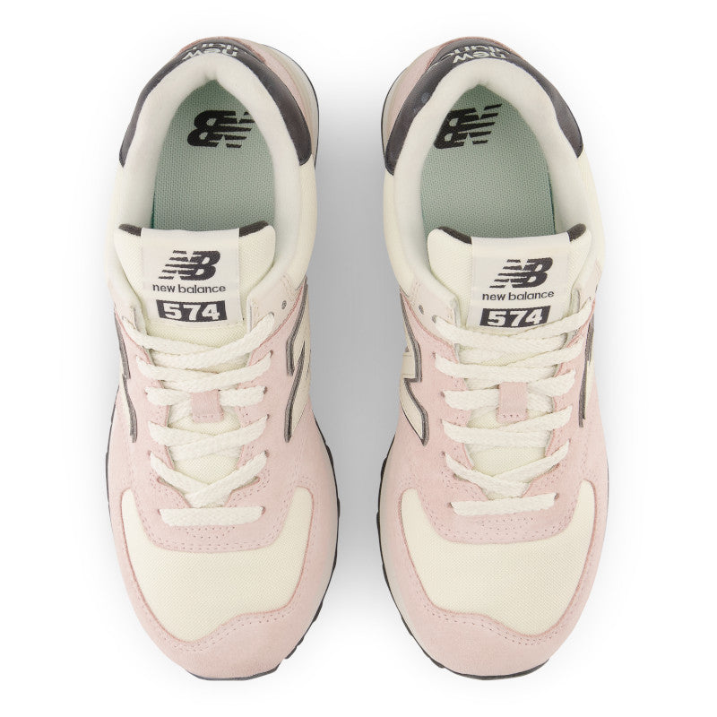 From the top view of the pair of women's 574 the flying NB logo is on the tongue along with a boxed 574 tag