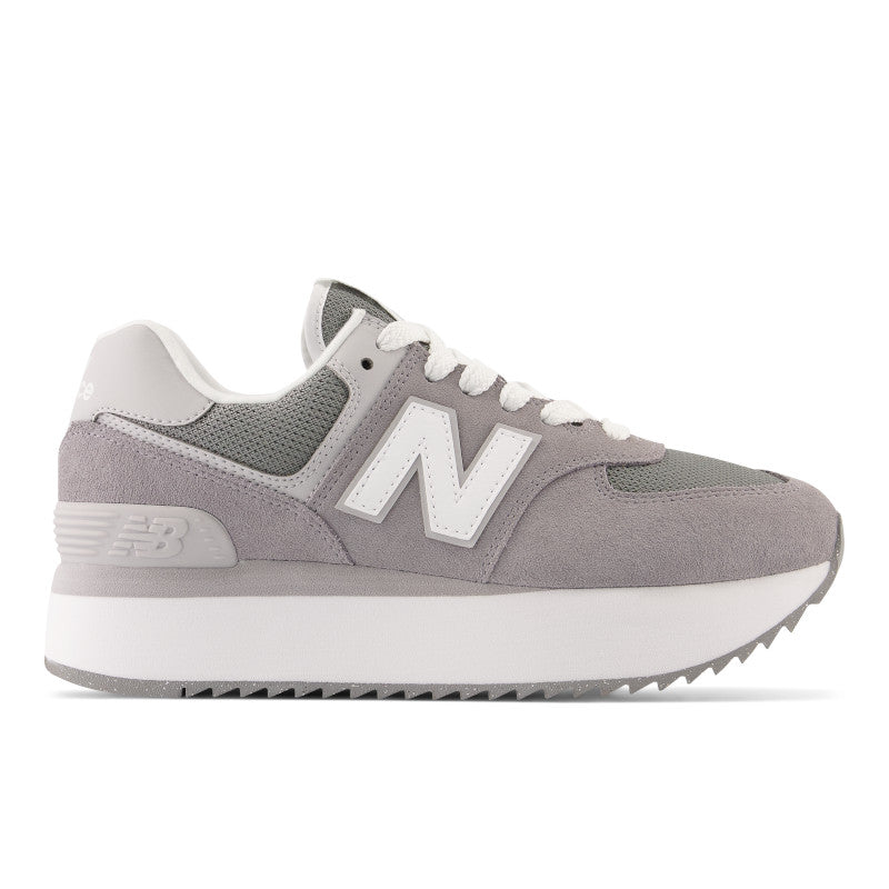 Lateral view of the Women's New Balance 574+ lifestyle shoe in the color Not Shadow.