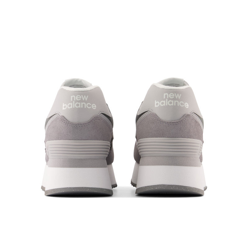 Back view of the Women's New Balance 574+ lifestyle shoe in the color Not Shadow.
