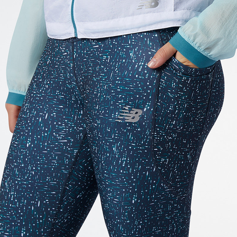 Detailed side view of the Women's Printed Impact Run Tight in the color Mountain Teal